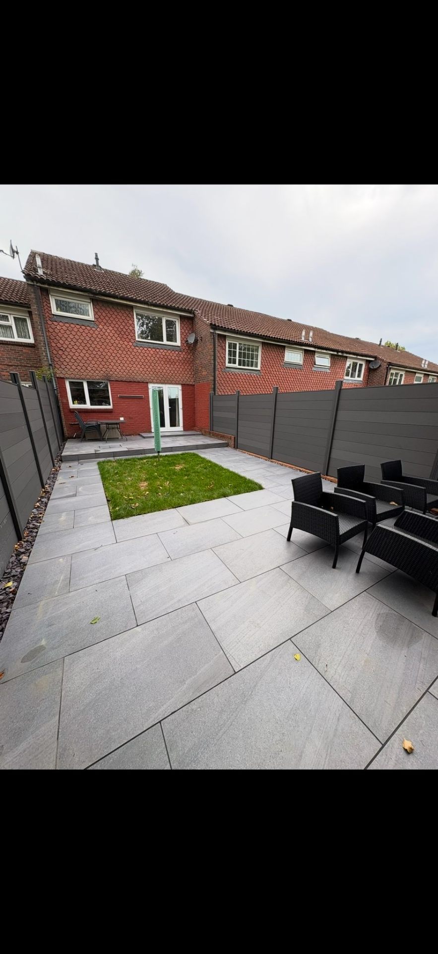 Close-board fence panels along garden boundary by Burton Builds fencing team