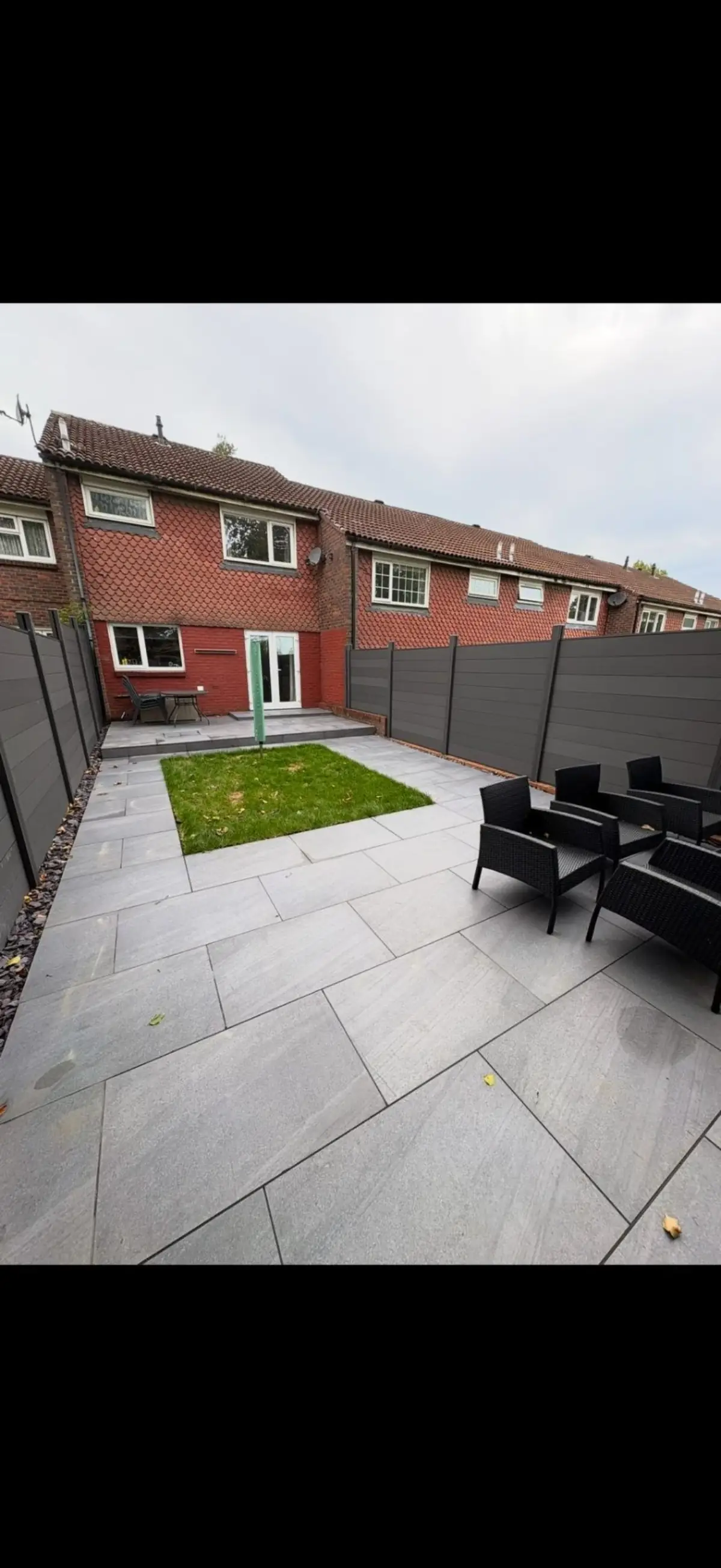 Close-board fence panels along garden boundary by Burton Builds fencing team